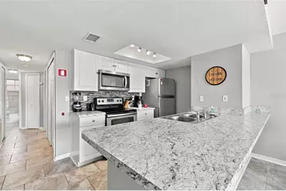 2486 Sweetwater Club Circle #75, Kissimmee, FL 34746 - Photo 7