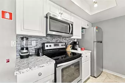 2486 Sweetwater Club Circle #75, Kissimmee, FL 34746 - Photo 11
