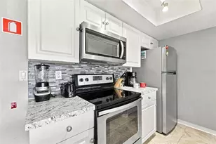 2486 Sweetwater Club Cir, Kissimmee, FL 34746 - Photo 11