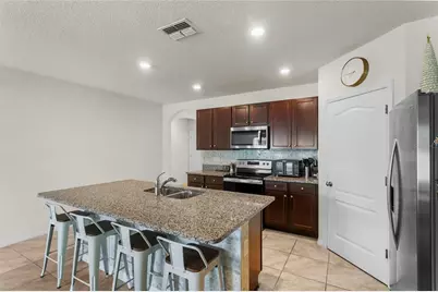 9005 Tuscan Cypress Street, Kissimmee, FL 34747 - Photo 7