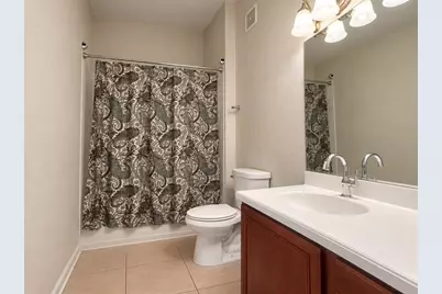3368 Robert Trent Jones Drive #40108, Orlando, FL 32835 - Photo 13