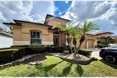 8494 Lake Waverly Lane, Orlando, FL 32829 - Photo 1