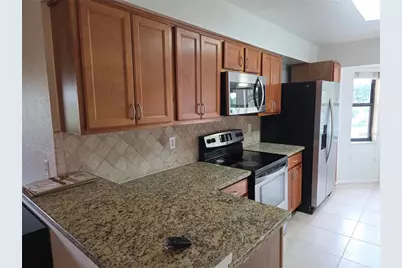 7867 Sugar Bend Drive #7867, Orlando, FL 32819 - Photo 13
