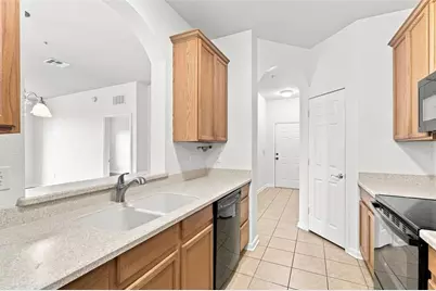 3326 Robert Trent Jones Drive #406, Orlando, FL 32835 - Photo 15