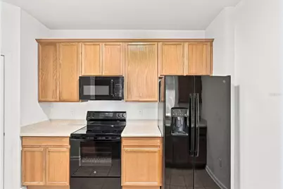3326 Robert Trent Jones Drive #406, Orlando, FL 32835 - Photo 13