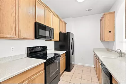 3326 Robert Trent Jones Drive #406, Orlando, FL 32835 - Photo 11