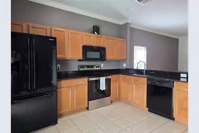 4908 Waterside Pointe Circle, Orlando, FL 32829 - Photo 11