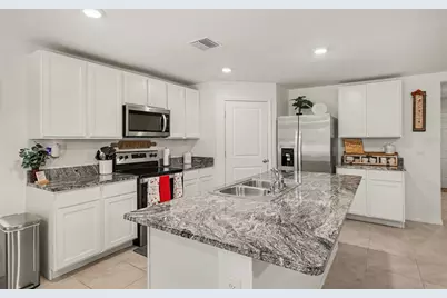 8693 Triumph Circle, Wildwood, FL 34785 - Photo 11