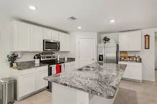 8693 Triumph Cir, Wildwood, FL 34785 - Photo 11