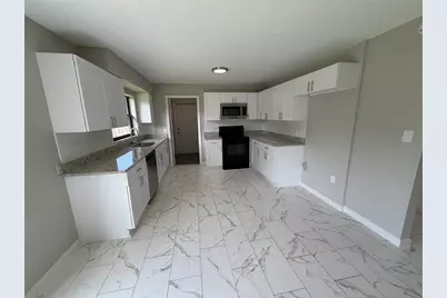 7008 Harwick Drive, Orlando, FL 32818 - Photo 5