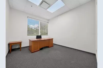 7751 Kingspointe Parkway #104, Orlando, FL 32819 - Photo 11