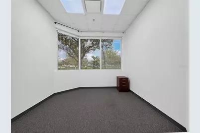 7751 Kingspointe Parkway #104, Orlando, FL 32819 - Photo 9