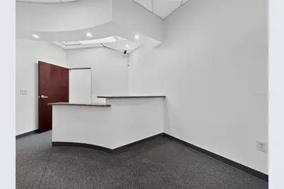 7751 Kingspointe Parkway #104, Orlando, FL 32819 - Photo 5