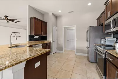 702 Country Walk Cove, Eagle Lake, FL 33839 - Photo 11