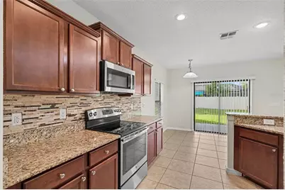 10015 Newminster Loop, Ruskin, FL 33573 - Photo 7