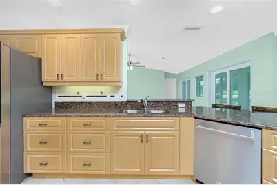 12001 SW Kingsway Circle, Lake Suzy, FL 34269 - Photo 23