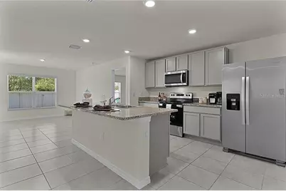 8661 Triumph Circle, Wildwood, FL 34785 - Photo 5