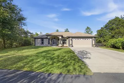 5693 W Woodlawn Street, Dunnellon, FL 34433 - Photo 1