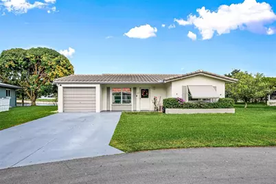 7011 NW 58th Court, Tamarac, FL 33321 - Photo 1