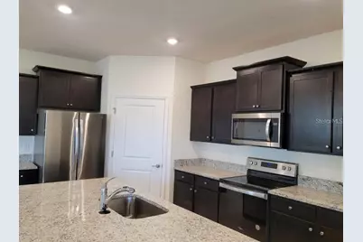 5084 Stokes Way, Wildwood, FL 34785 - Photo 7