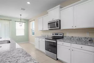 7974 Penrose Pl, Wildwood, FL 34785 - Photo 13