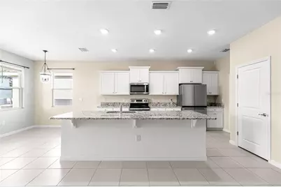 7974 Penrose Place, Wildwood, FL 34785 - Photo 11
