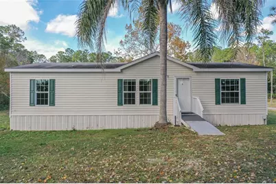 17794 Commonwealth Avenue N, Polk City, FL 33868 - Photo 1