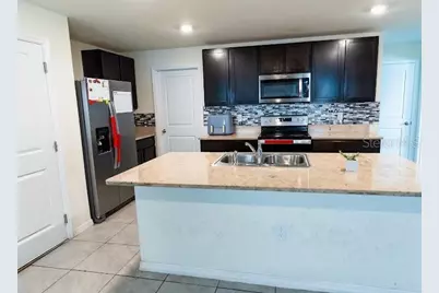 5509 Logan Cave Avenue N, Wimauma, FL 33598 - Photo 11