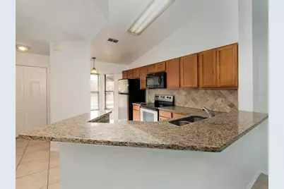 7654 Sugar Bend Drive #7654, Orlando, FL 32819 - Photo 5