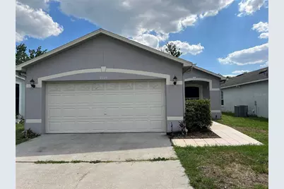 8824 Valencia Oaks Court, Orlando, FL 32825 - Photo 1