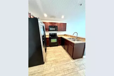 13418 Tea Rose Way #103, Orlando, FL 32824 - Photo 5