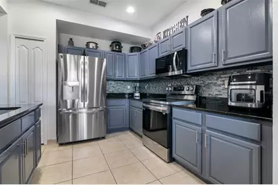 1544 Portofino Meadows Boulevard, Orlando, FL 32824 - Photo 11