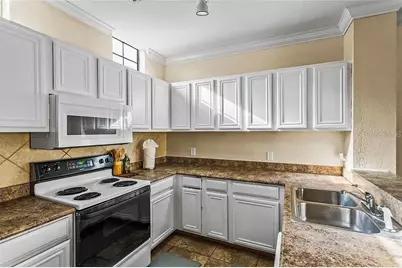 6105 Metrowest Boulevard #103, Orlando, FL 32835 - Photo 3