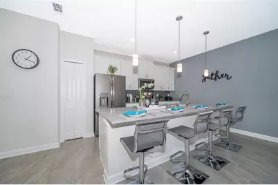 296 Ocean Course Avenue, Champions Gate, FL 33896 - Photo 13