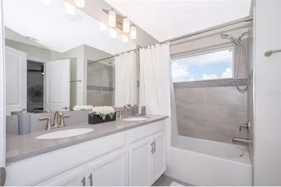 296 Ocean Course Avenue, Champions Gate, FL 33896 - Photo 19