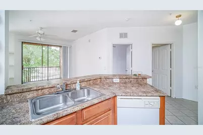 6149 Metrowest Boulevard #203, Orlando, FL 32835 - Photo 7