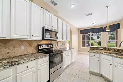 7670 Milano Drive, Orlando, FL 32835 - Photo 11