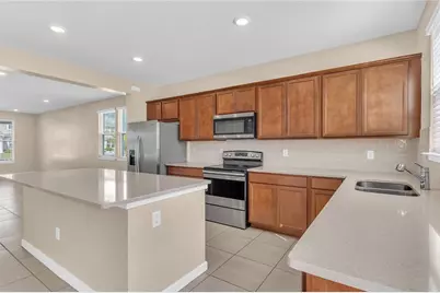 9744 Brown Burrow Street, Orlando, FL 32829 - Photo 11