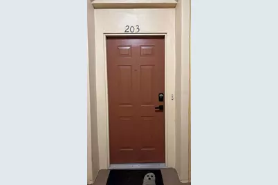 8710 Saratoga Inlet Drive #203, Orlando, FL 32829 - Photo 1