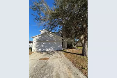 423 Gannet Court, Poinciana, FL 34759 - Photo 1