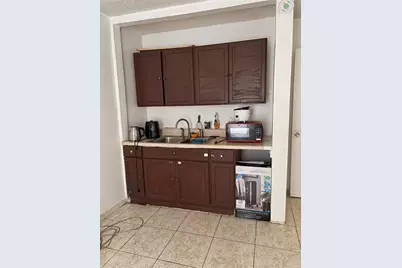 1311 Woodman Way, Orlando, FL 32818 - Photo 17