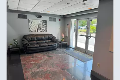 7345 W Sand Lake Road #307, Orlando, FL 32819 - Photo 3