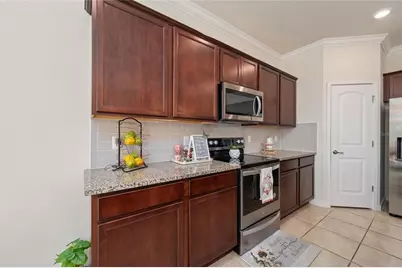 9544 Brown Burrow Street, Orlando, FL 32829 - Photo 13