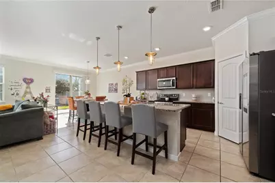 9544 Brown Burrow Street, Orlando, FL 32829 - Photo 11