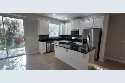 9478 Silver Buttonwood Street, Orlando, FL 32832 - Photo 5