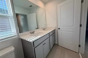 9948 Red Canoe Aly, Orlando, FL 32832 - Photo 23