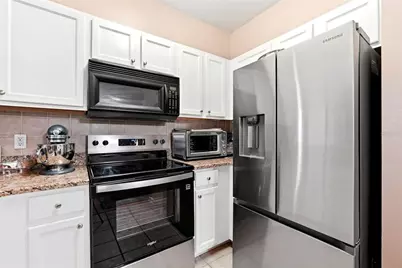 12837 Madison Pointe Circle #208, Orlando, FL 32821 - Photo 7