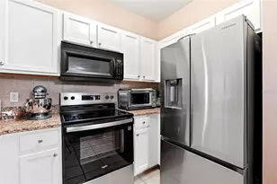 12837 Madison Pointe Cir, Orlando, FL 32821 - Photo 7