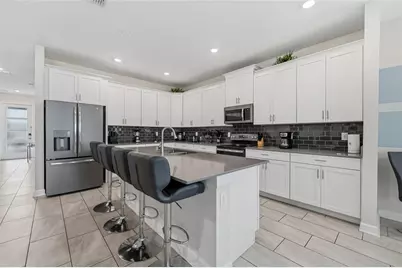 8986 Cabot Cliffs Drive, Champions Gate, FL 33896 - Photo 9