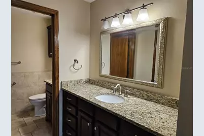 5489 Caurus Court, Orlando, FL 32808 - Photo 13